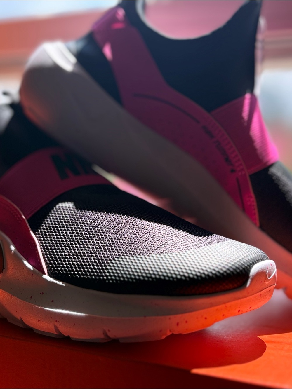 Nike Kids Black and Pink Slip-On Sneakers